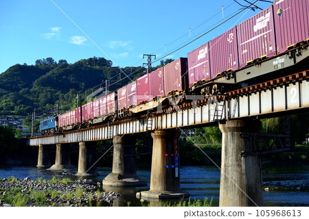 A container freight train running on the Hakubi Line (vivid style) 105968613