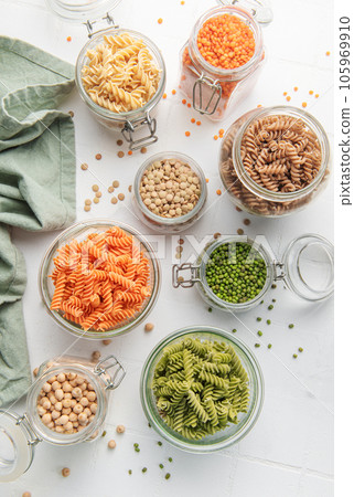 A variety of fusilli pasta from different types of legumes. Gluten-free pasta. A variety of fusilli pasta from different types of legumes. Gluten-free pasta. 105969910