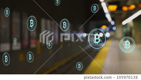 Image of multiple bitcoin symbols floating against blurred view of train arriving at a station Image of multiple bitcoin symbols floating against blurred view of train arriving at a station 105970138