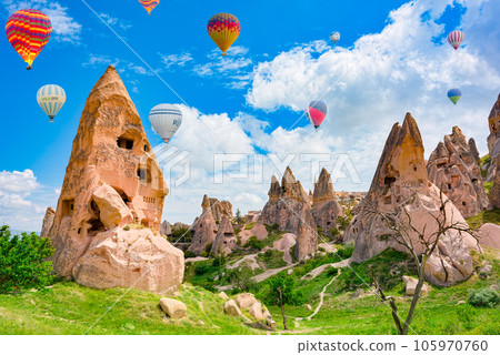 Air balloons in Cappadocia-the ancient Uchisar Castle fortress. Air balloons in Cappadocia-the ancient Uchisar Castle fortress. 105970760