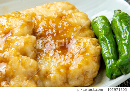 Close-up of conger pike teriyaki. 105971803