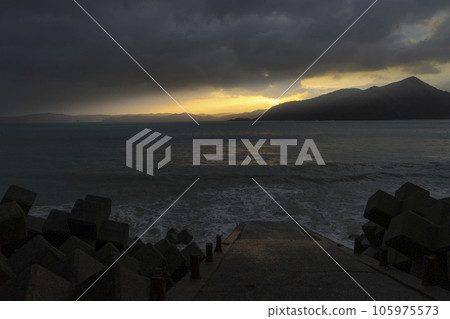 Angel's ladder pouring into the sea 105975573