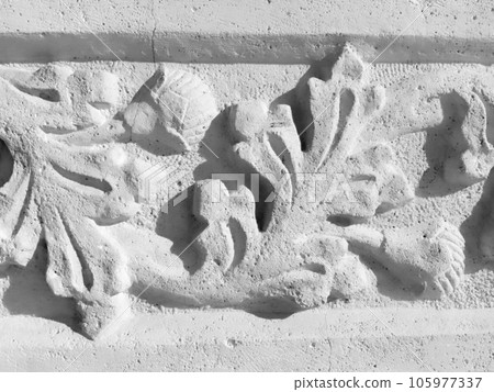 Ornament, sculptural drawing of structured plant elements. Decorating the wall with stucco in Dubrovnik, Croatia. A strip of shamrocks. Acanthus is a herbal vegetation, leaves are stucco elements Ornament, sculptural drawing of structured plant elements. Decorating the wall with stucco in Dubrovnik, Croatia. A strip of shamrocks. Acanthus is a herbal vegetation, leaves are stucco elements 105977337