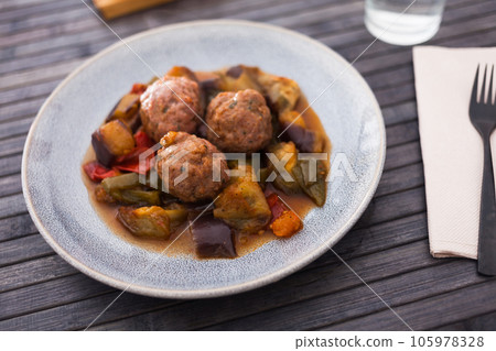 Cooked meatballs with stewed eggplant with haze in bowl Cooked meatballs with stewed eggplant with haze in bowl 105978328