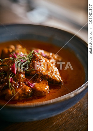Fried Fish with Thai Red Curry Sauce Fried Fish with Thai Red Curry Sauce 105981397
