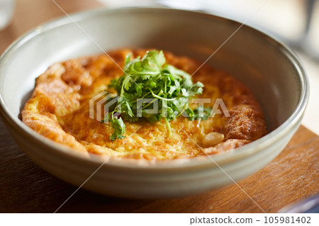 Traditional Thai omelette with coriander Traditional Thai omelette with coriander 105981402