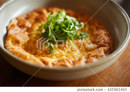 Traditional Thai omelette with coriander Traditional Thai omelette with coriander 105981403