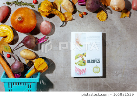 autumn flat lay on concrete background with cookbook autumn flat lay on concrete background with cookbook 105981539