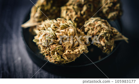 Dry CBD cannabis as dried hemp flowers 105983177