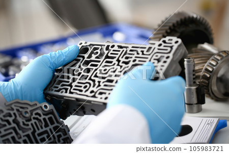 The auto repair service repairman in automatic The auto repair service repairman in automatic 105983721