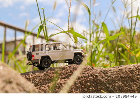Minicar on the rock 105984449