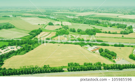 Agricultural land close to the town of Piacenza, Emilia-Romagna region of Italy. Aerial view 105985596