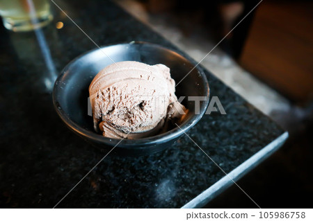 chocolate ice cream, cup of chocolate ice cream chocolate ice cream, cup of chocolate ice cream 105986758