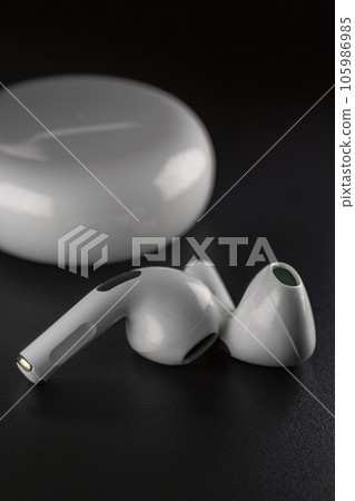 small white headphones 105986985