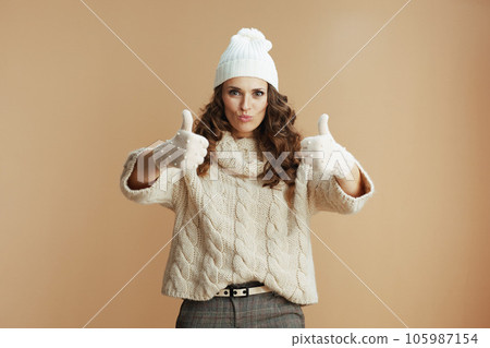 stylish 40 years old woman showing thumbs up 105987154