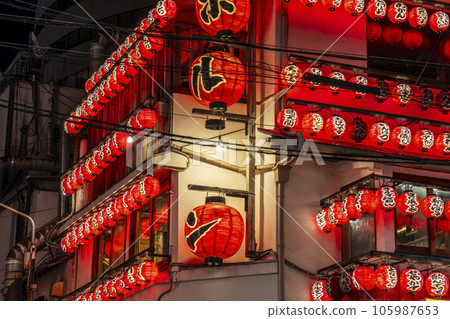 Ura-Namba, Sennichimae at night, a building lined with countless red lanterns 105987653