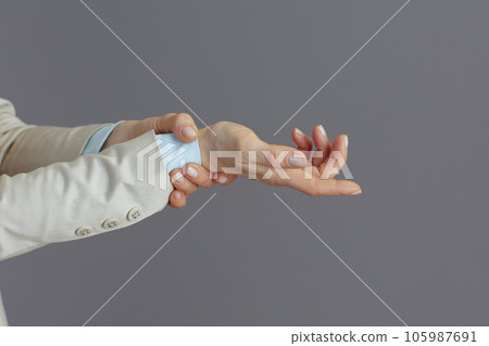 Stylish business owner woman in light business suit Stylish business owner woman in light business suit 105987691