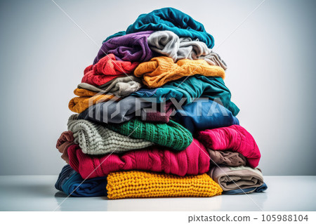 Lots of clothes on a white background. Generative AI technology. 105988104