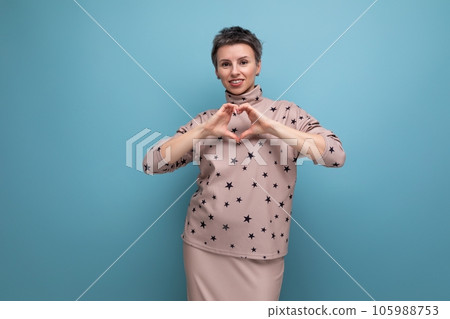 pretty positive young grey-haired european woman dressed in blouse and skirt pretty positive young grey-haired european woman dressed in blouse and skirt 105988753