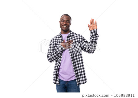positive young american man in casual shirt on white background with copy space 105988911