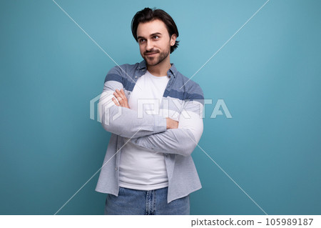 serious brutal brunette man in informal style serious brutal brunette man in informal style 105989187
