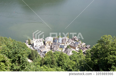 Lake Hallstatt and the city of Hallstatt seen from a mountainside in Upper Austria, Austria Lake Hallstatt and the city of Hallstatt seen from a mountainside in Upper Austria, Austria 105989366