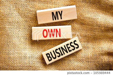 My own business symbol. Concept words My own business on wooden block. Beautiful canvas table canvas background. Business motivational my own business concept. Copy space. My own business symbol. Concept words My own business on wooden block. Beautiful canvas table canvas background. Business motivational my own business concept. Copy space. 105989444