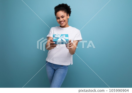 young hispanic brunette woman got a surprise for her birthday 105990904