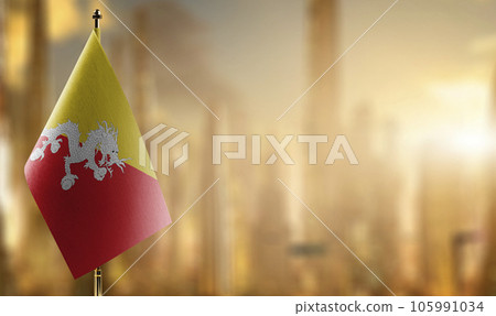Small flags of the Bhutan on an abstract blurry background Small flags of the Bhutan on an abstract blurry background 105991034