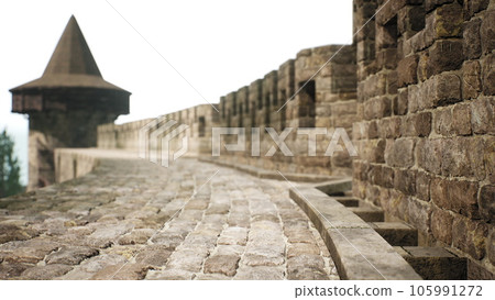 old castle walls at the sunset 105991272