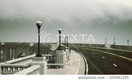 empty bridge fragment near the mountains empty bridge fragment near the mountains 105991295