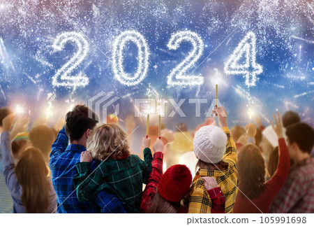 Happy new year. Family watching fireworks. 105991698