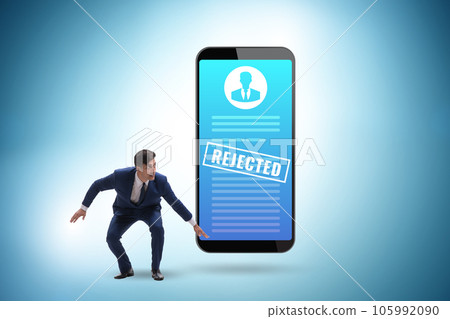 Man receiving rejection notice on his cv 105992090