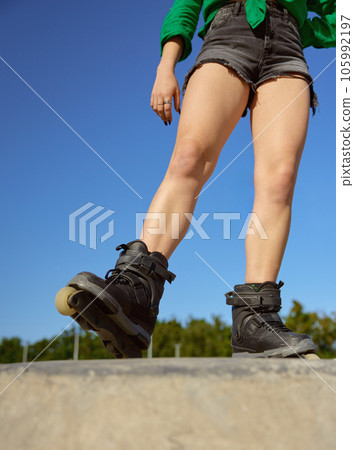 Crop view of teenager girl on roller skates 105992197
