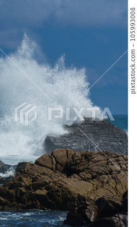 The moment the waves collide with the rocks The moment the waves collide with the rocks 105993008