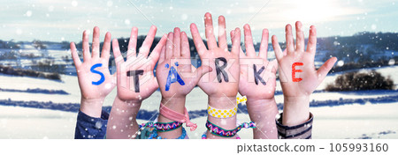 Children Hands Building Word Staerke Means Strength, Winter Background 105993160