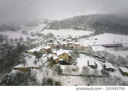 Traditional mountain remote cabins and houses in winter highlands Traditional mountain remote cabins and houses in winter highlands 105993769