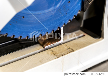 metal saw with tool cutting disc makes a cut metal saw with tool cutting disc makes a cut 105994296