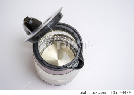 glass electric kettle with an open lid on a white background glass electric kettle with an open lid on a white background 105994429