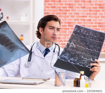 Young doctor working in hospital 105994601