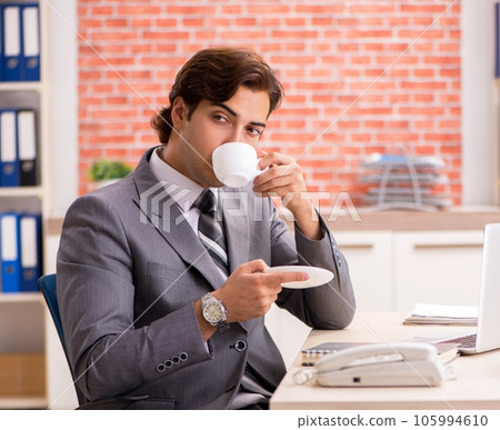 Young businessman working in the office Young businessman working in the office 105994610