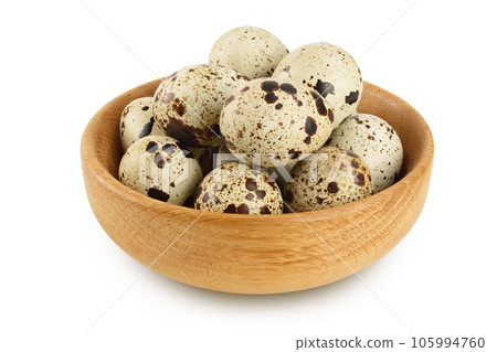 Raw quail egg in wooden bowl isolated on white background with full depth of field Raw quail egg in wooden bowl isolated on white background with full depth of field 105994760