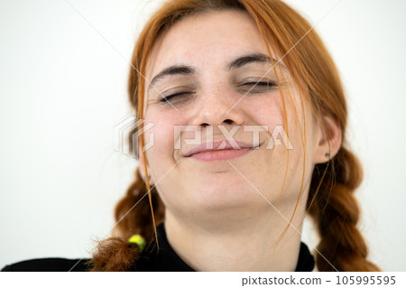 Close up portrait of redhead pretty teenage girl. Close up portrait of redhead pretty teenage girl. 105995595