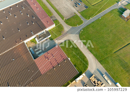 Aerial view of modern factory structure for production and distribution of industrial equipment. Concept of global industry Aerial view of modern factory structure for production and distribution of industrial equipment. Concept of global industry 105997229