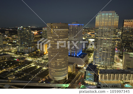 Aerial view of downtown district of Tampa city in Florida, USA. Brightly illuminated high skyscraper buildings in modern american midtown 105997345
