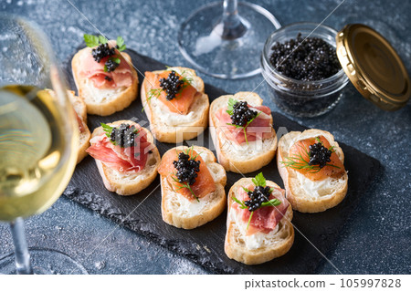 Bottled caviar and caviar appetizers 105997828