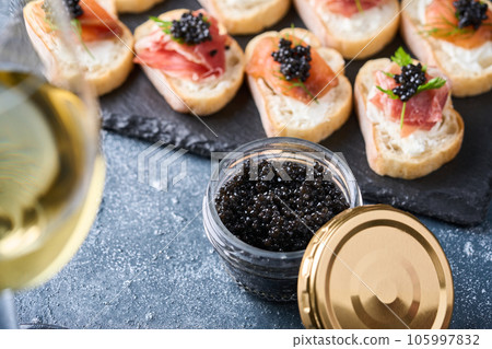 Bottled caviar and caviar appetizers 105997832