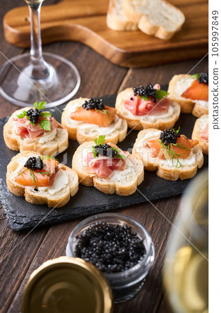 Bottled caviar and caviar appetizers 105997849