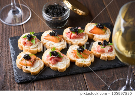 Bottled caviar and caviar appetizers 105997850
