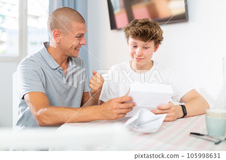 Father and son have recieved letter 105998631